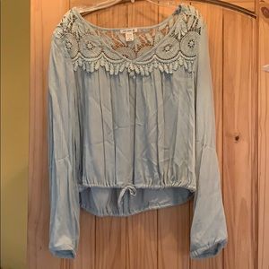 Pale green blouse with lace detail